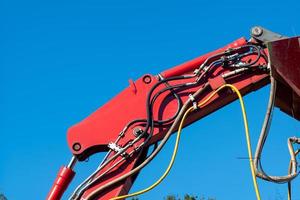 part of orange construction crane photo