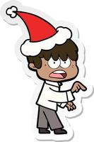 worried sticker cartoon of a boy wearing santa hat vector