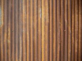 Old zinc wall texture background, rusty on galvanized metal panel sheeting. photo