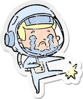 distressed sticker of a cartoon crying astronaut vector