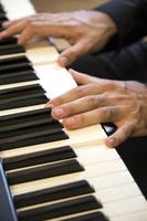 Piano player closeup photo