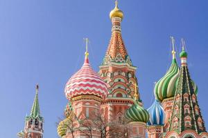 St Basil's cathedral on Red Square in Moscow. Domes the cathedral lit by the sun photo