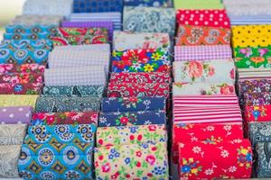 Assortment of natural fabrics and textiles. DIY materiials for craft and scrapbooking. Sewing industry concept photo