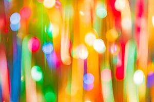 Defocused ligths of Christmas tree. Abstract neon background texture
