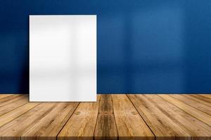 Blank white paper poster on plank wooden floor and concrete wall, Template mock up for adding your content, leave side space for display of product. photo