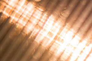 Defocused Polycarbonate plastic sheet, abstract background texture photo