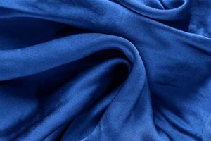 Trend color 2020 classic blue, silk background for design. photo