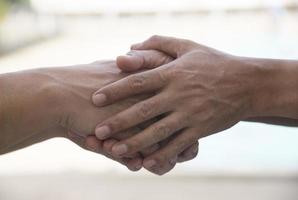 A man giving a hand for sympathy photo