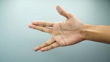 style of hand finger sign isolated on white background photo