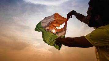 indian flag in sky , Man with Indian flag photo