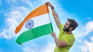 a boy with indian flag in sky , Man with Indian flag photo