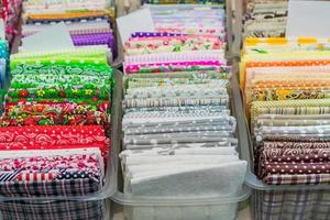 Assortment of natural fabrics and textiles. DIY materiials for craft and scrapbooking. Sewing industry concept photo