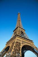 Eiffel tower on blue sky background photo