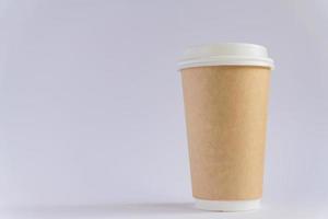 craft paper coffee cup. Coff to go on gray background photo