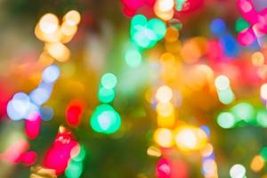 Abstract background of colorful lines in motion. blurred neon rainbow leds, festive backdrop of fireworks. Decocused image photo