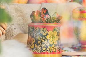 Russian traditional hohloma spoons on the table, still life, soft focus photo