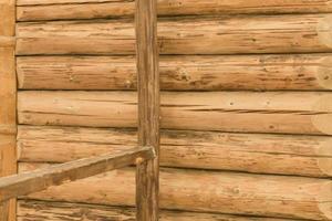 Brown wood log wall surface background photo