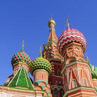 St Basil's cathedral on Red Square in Moscow. Domes the cathedral against blue sky photo