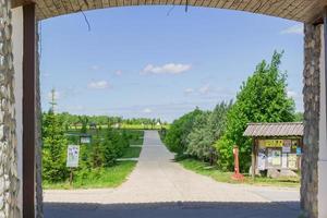 Russia, Kaluga region, 2018 - Entrance to the Ethnomir Park. ethnographic and amusement park-museum