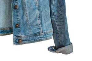 bottom of Blue denim woman jacket. Clothes fragment isolated on white background photo