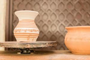 clay jar dries on round stand photo