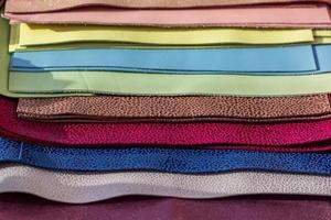 Leather samples of different colors for interior design and craft. Background texture. photo