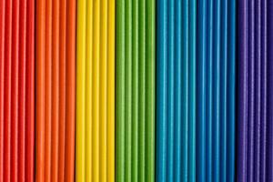 Rainbow colors of modeling clay. Multicolored plasticine bars background. photo