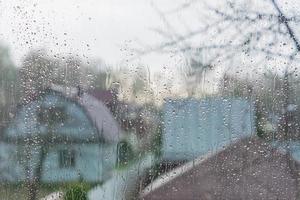 Rain drops on a window glass. Abstract background texture. photo