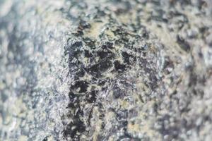 close up of black and white stone texture. Natural background photo