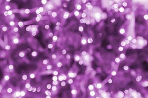 bokeh garland background. Abstract festive backdrop. greeting card for christmas and winter holidays, Toned image photo