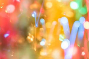 Abstract burred texture background of colorful bokeh motion. Long exposure of small neon lights photo