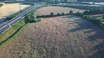 High Angle View of Luton Airport Junction Interchange of Motorways M1 J10 at Luton City of England UK. it is Connection Luton City and London Luton Airport Image Created on 11th August 2022 with Drone video