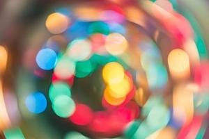 Abstract burred texture background of colorful bokeh motion. Long exposure of small neon lights photo