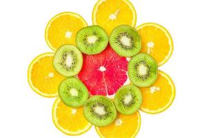 citrus slice, kiwi, oranges and grapefruits isolated on white background. Fruits backdrop photo