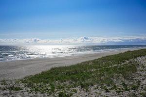 Sea landscape of the Baltic sea with coastal sand dunes of the Curonian spit. photo