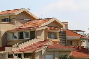 Karmiel Israel May 20, 1920. Red tiled roof of a residential building photo