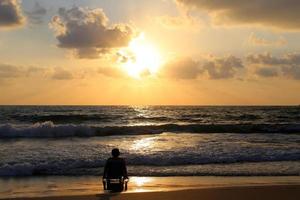 The sun sets below the horizon on the Mediterranean Sea in northern Israel. photo