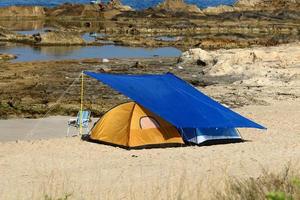 Tourist tent on the Mediterranean coast. photo