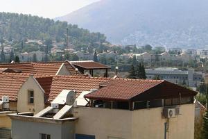 Karmiel Israel December 4, 2019. Red tiled roof on a residential building. photo