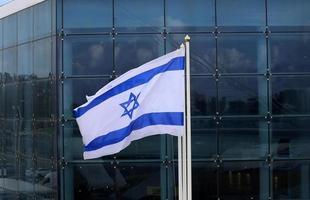 The blue and white Israeli flag with the Star of David. photo