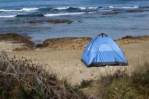 Tourist tent on the Mediterranean coast. photo