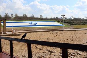 The blue and white Israeli flag with the Star of David. photo