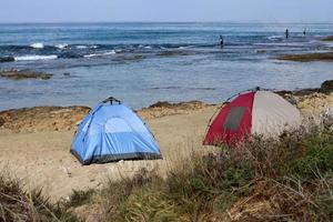 Tourist tent on the Mediterranean coast. photo