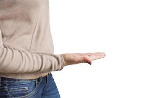 Empty female woman hand  showing empty copy space on the open hand palm for text, white background. photo