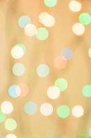 Abstract bokeh background. Defocused light from garland. photo