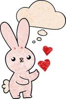 cute cartoon rabbit with love hearts and thought bubble in grunge texture pattern style vector