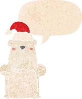 cartoon bear wearing christmas hat and speech bubble in retro textured style