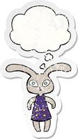 cute cartoon rabbit and thought bubble as a distressed worn sticker vector