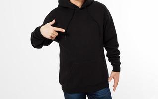 Man in black sweatshirt pointed hand, black hoodies front isolated, mock up,copy space cropped image photo