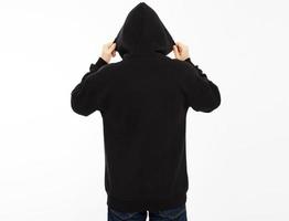 Rear view of hooded male person isolated on white background with copy space mock up photo